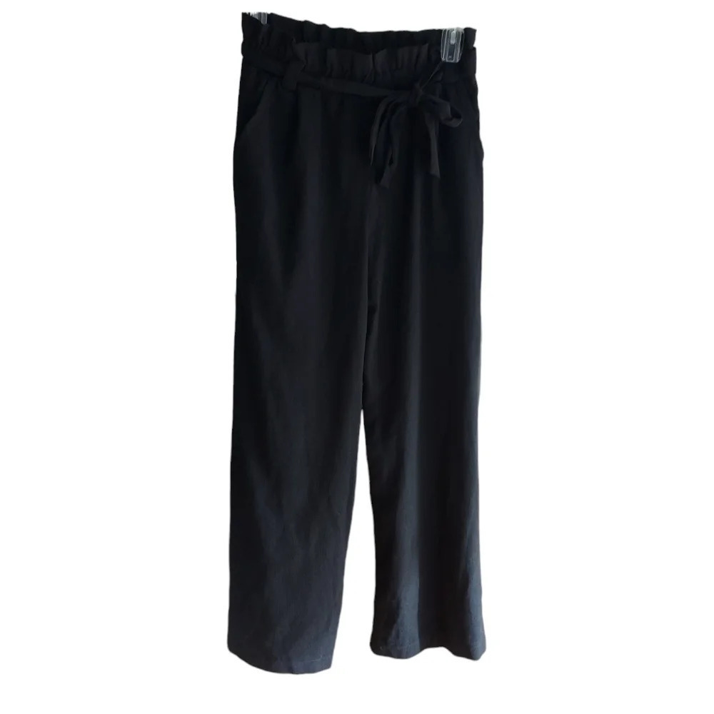 Have black pants with pockets and belt